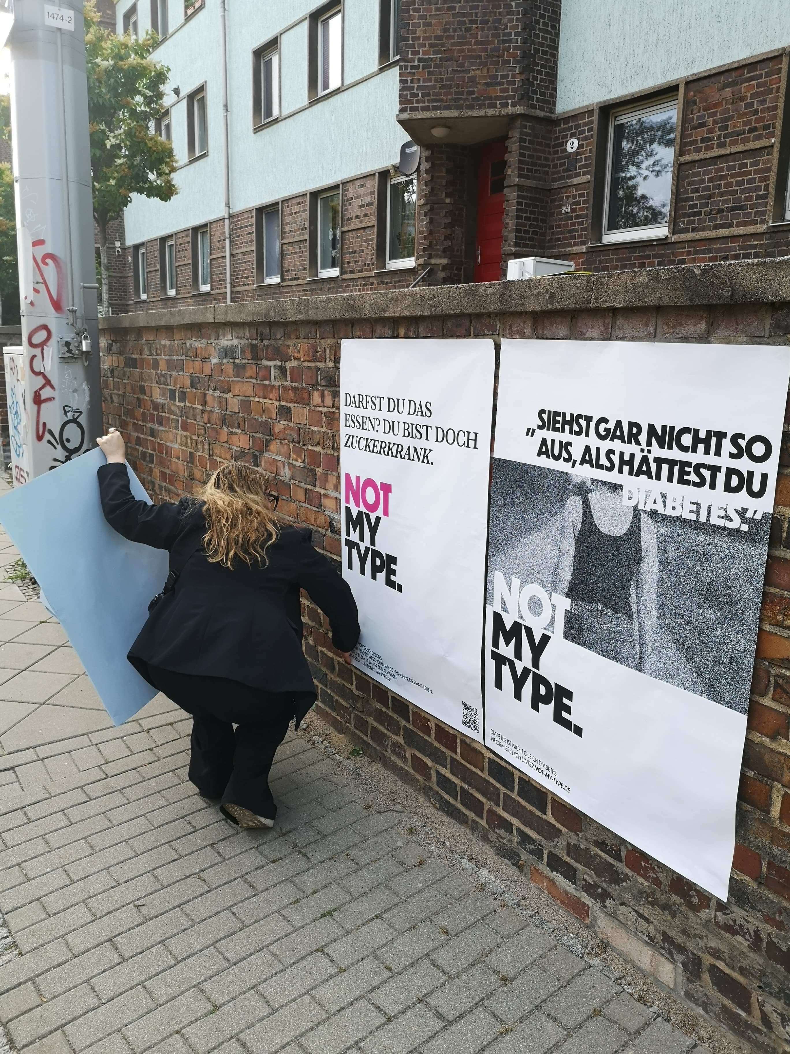 User testing different poster versions in public spaces.